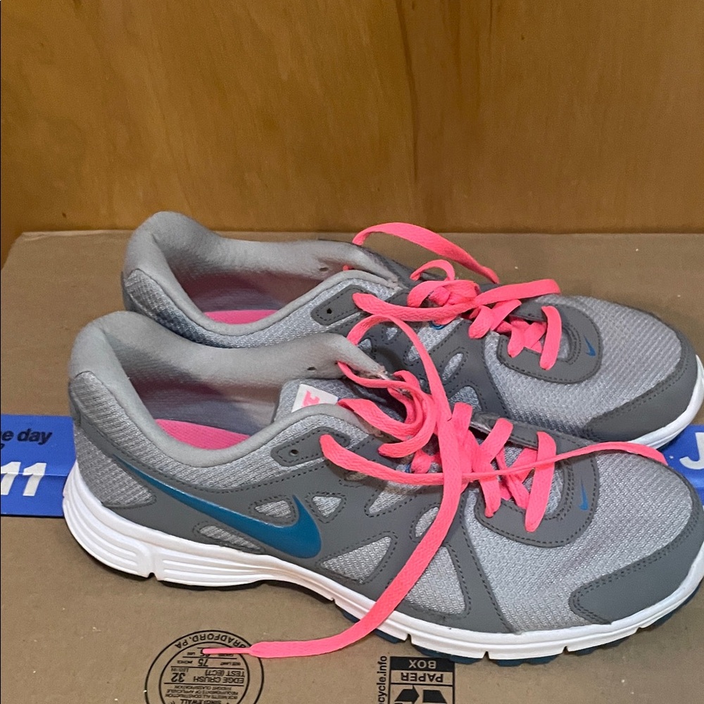 Nike Women's Gray Sneakers with Pink Laces